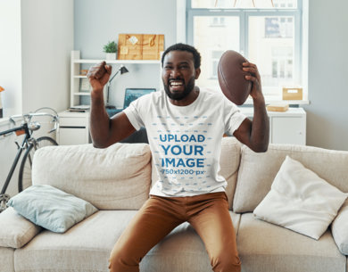 T-Shirt Mockup Featuring an Excited Man With a Football Ball