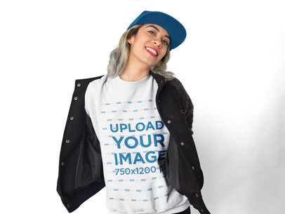 Happy Woman Wearing a Tshirt Template and a Hat While in the Studio