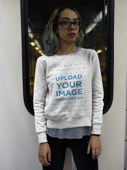 Hipster Woman Wearing a Crewneck Sweatshirt Template while Looking to the Camera