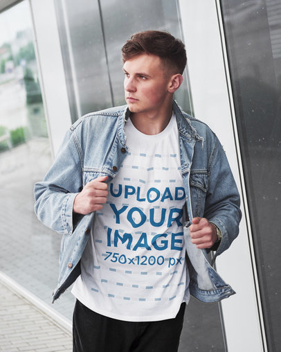 T-Shirt Mockup of a Serious Man Walking on the Street
