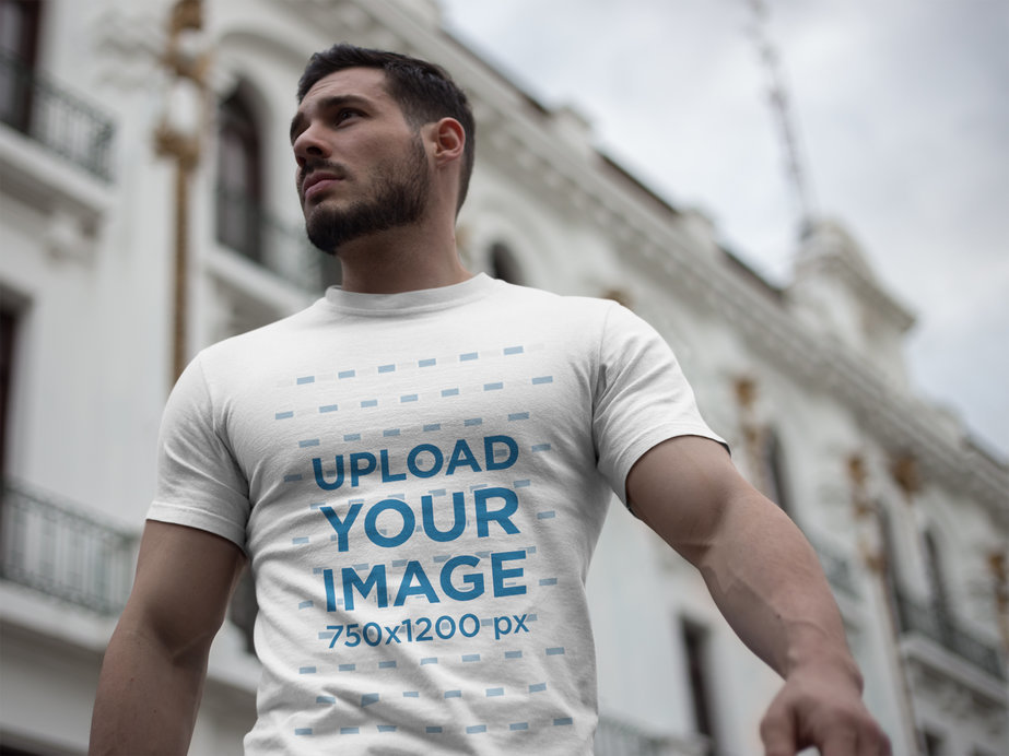 Strong Handsome Man Wearing a Tshirt Mockup While Walking in the City