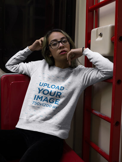 Relaxing Woman Wearing a Crewneck Sweatshirt Mockup