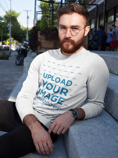 Handsome Man with Beard Wearing a Crew Neck Sweatshirt Template While Lying on Stairway