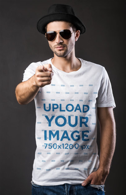 Round-Neck Tee Mockup of a Man with Sunglasses Pointing at the Camera