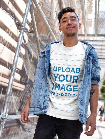Asian Man Wearing a Tshirt Template While on a Bridge