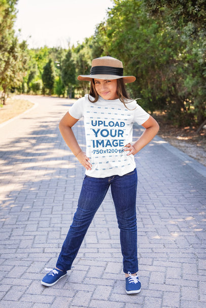 Heathered T-Shirt Mockup of a Cool Girl Posing in a Park