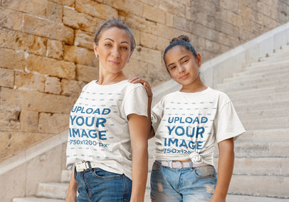 Round-Neck T-Shirt Mockup Featuring a Happy Woman With Her Little Daughter