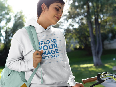 Woman on a Bike Wearing a Pullover Hoodie Template