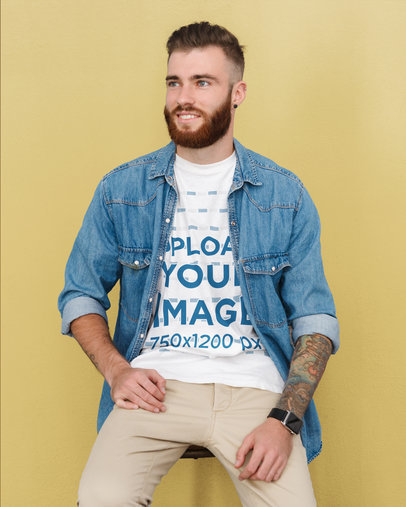 T-Shirt Mockup of a Bearded Man with a Tattooed Arm on a Chair 46052-r-el2