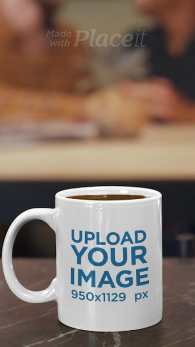 Video of an 11 oz Coffee Mug on a Table While a Couple is Having Breakfast