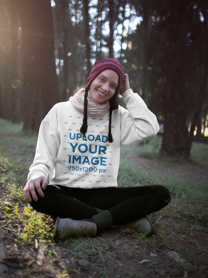 Happy Woman Wearing a Crewneck Sweatshirt Template in the Cold Forest