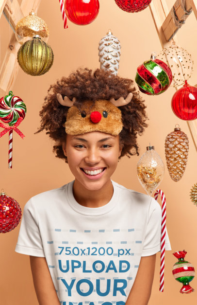 Round-Neck Tee Mockup of a Smiling Woman Surrounded by Xmas Ornaments