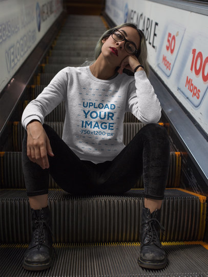 Girl Wearing a Crewneck Sweatshirt Template Sitting on Electric Stairways a17651