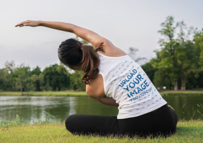 Racerback Tank Top Mockup of a Woman Doing Yoga by a Lake