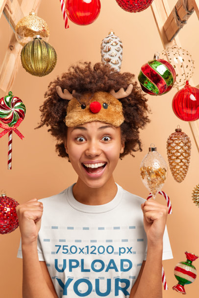 T-Shirt Mockup of an Enthusiastic Woman Surrounded by Christmas Ornaments