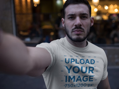 Selfie of a Buff Dude Wearing a T-Shirt Mockup
