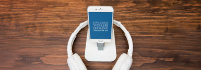 Wide Mockup of a White iPhone 6 on Stand with Headphones