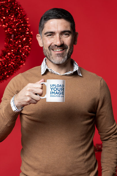 Coffee Mug Mockup Featuring a Middle-Aged Man in a Christmas Setting M18350