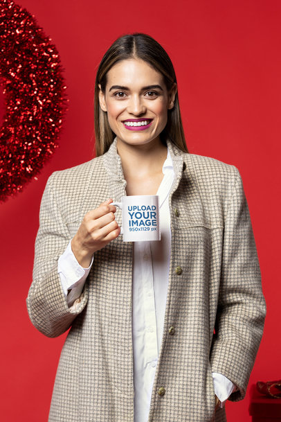 11 oz Coffee Mug Mockup Featuring a Stylish Woman Celebrating Christmas