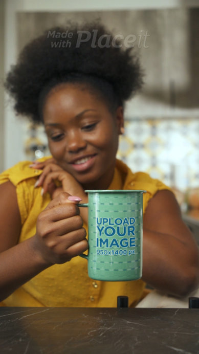 Video of a Happy Woman Holding a 15 oz Enamel Coffee Mug
