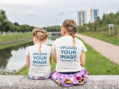 Back-View T-Shirt Mockup of Two Sisters Sitting Together m19022-r-el2