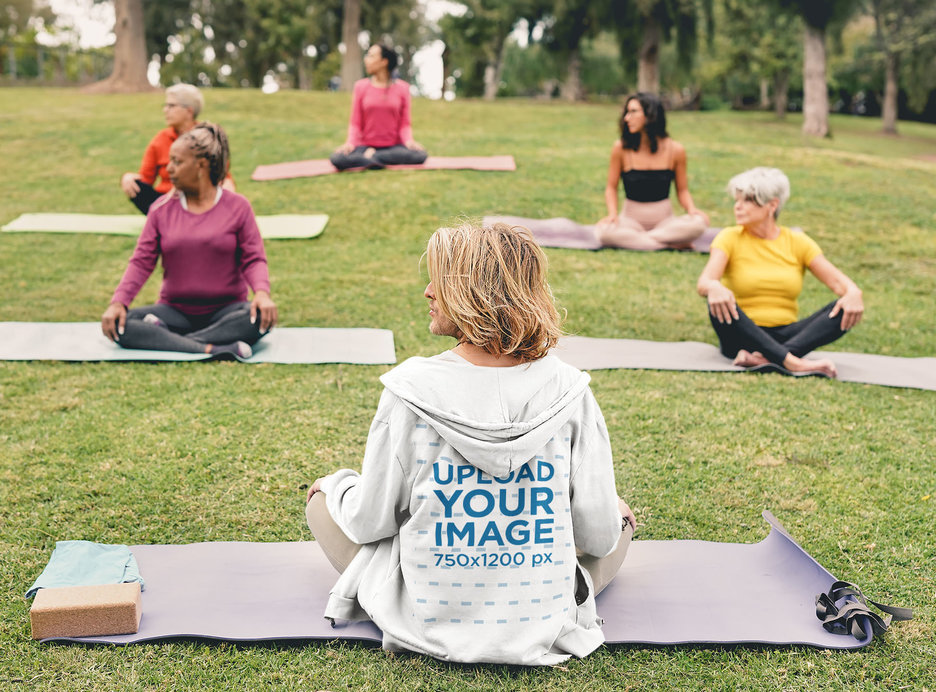 Full-Zip Hoodie Mockup of a Yoga Instructor at a Park