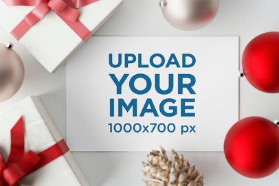 Mockup of a Greeting Card Surrounded by Christmas Decorations