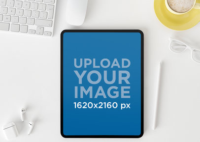 Mockup Featuring an iPad Placed on a White Desk m19231-r-el2