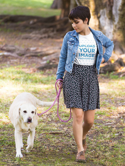 Woman Walking her Dog Wearing a T-Shirt Mockup at a Park