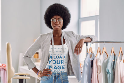 Tank Top Mockup of a Fashion Designer Posing by a Clothing Rack m17148 r-el2