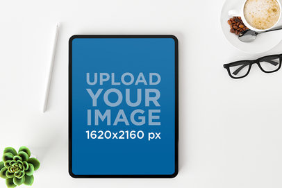 iPad Pro Mockup Featuring a Cappuccino and a Small Plant m19229-r-el2