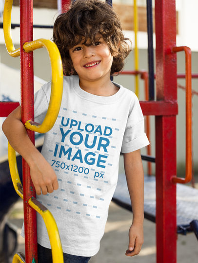 Boy with Curly Hair Wearing a Tshirt Mockup While Smiling