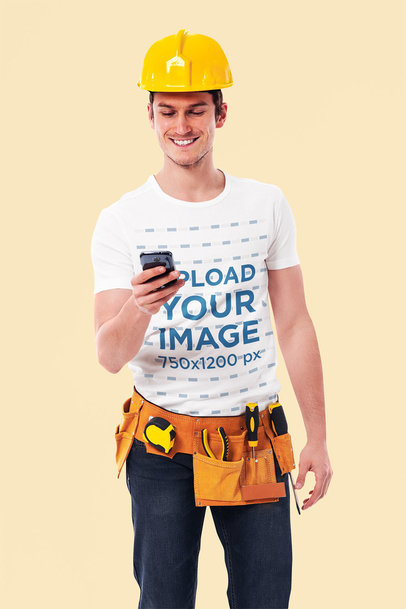 Studio Mockup of a Man Wearing a T-Shirt While Dressed as a Construction Worker