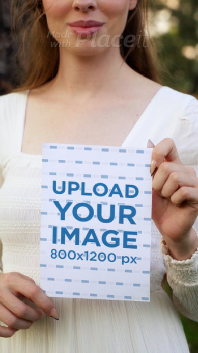 Video Featuring a Woman and a Man Holding Customizable Flyers 