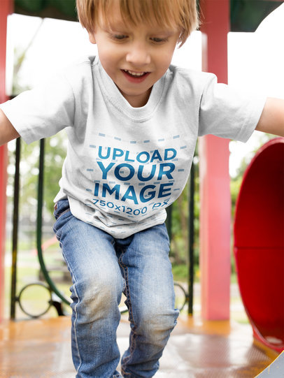 Small Kid at the Playground Wearing a Baggy Tee Mockup