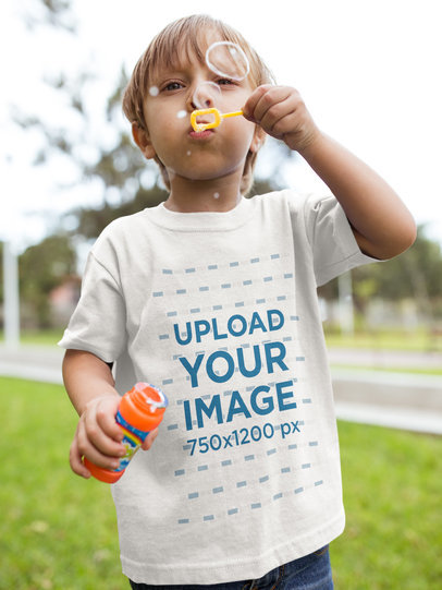 Boy Making Bubbles While Wearing a Round Neck Tee Mockup