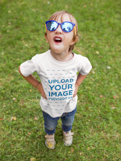 Boy with Toy Glasses Wearing a Tshirt Mockup Making Faces