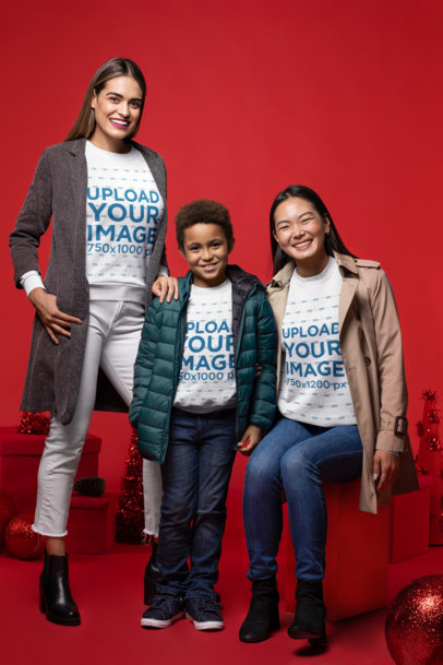 Sweatshirt Mockup of Two Women Celebrating Christmas with their Kid