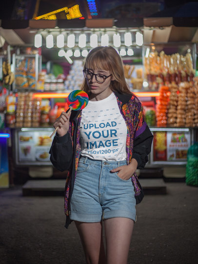 Woman with a Candy Wearing a Tshirt Mockup in the Night