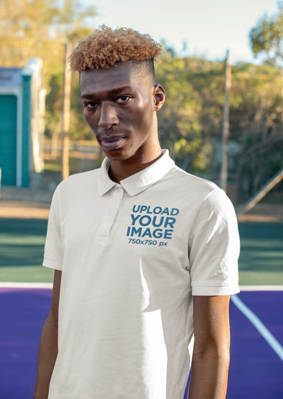 Polo Shirt Mockup of a Serious Man with Curly Dyed Hair Looking at the Camera