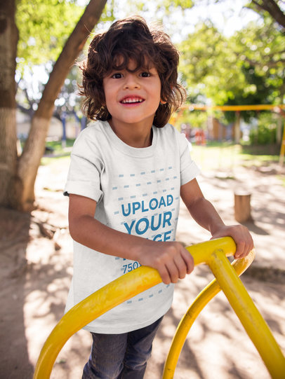 Smiling Kid Wearing a Tshirt Mockup while at a Playground a17870