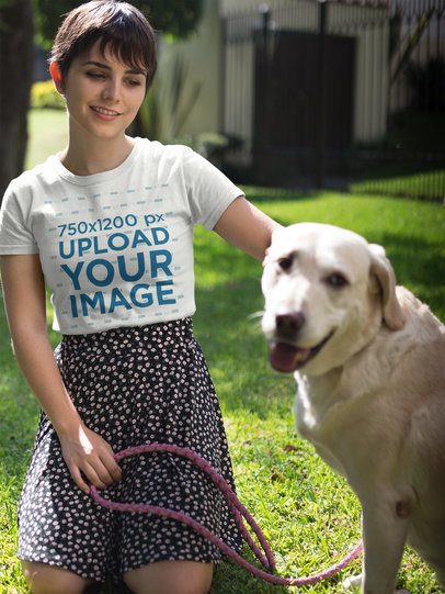 Happy Woman Wearing a Tshirt Mockup while with her Dog