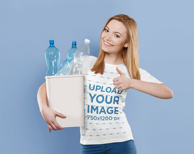 T-Shirt Mockup of a Woman with a Recycling Can and Giving a Thumb Up