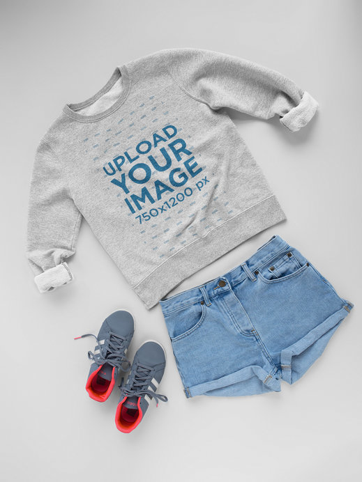 Shorts and Sneakers with Crew Neck Sweatshirt Template Lying on a White Surface