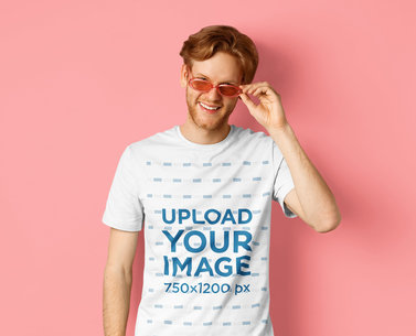 T-Shirt Mockup of a Red-Haired Young Man Wearing Shades