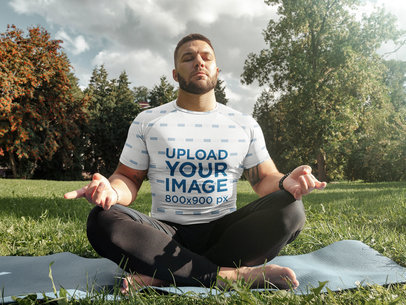 T-Shirt Mockup of a Bearded Man Meditating Outdoors m19514-r-el2