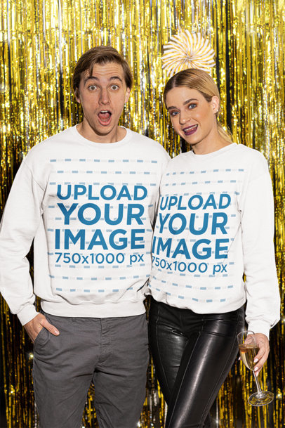 Sweatshirt Mockup of a Couple Having Fun Celebrating New Year
