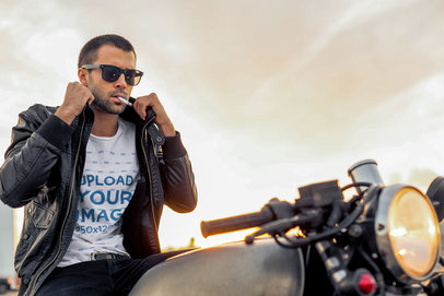T-Shirt Mockup of a Man With a Cool Pose Wearing Sunglasses and a Leather Jacket While Smoking
