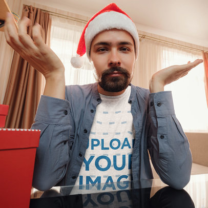 Heathered T-Shirt Mockup of a Man Wearing a Christmas Hat