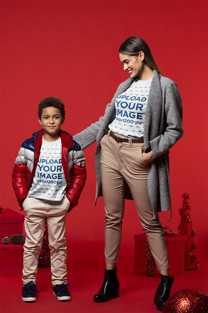 Christmas-Themed T-Shirt Mockup Featuring a Woman and Her Son at a Studio